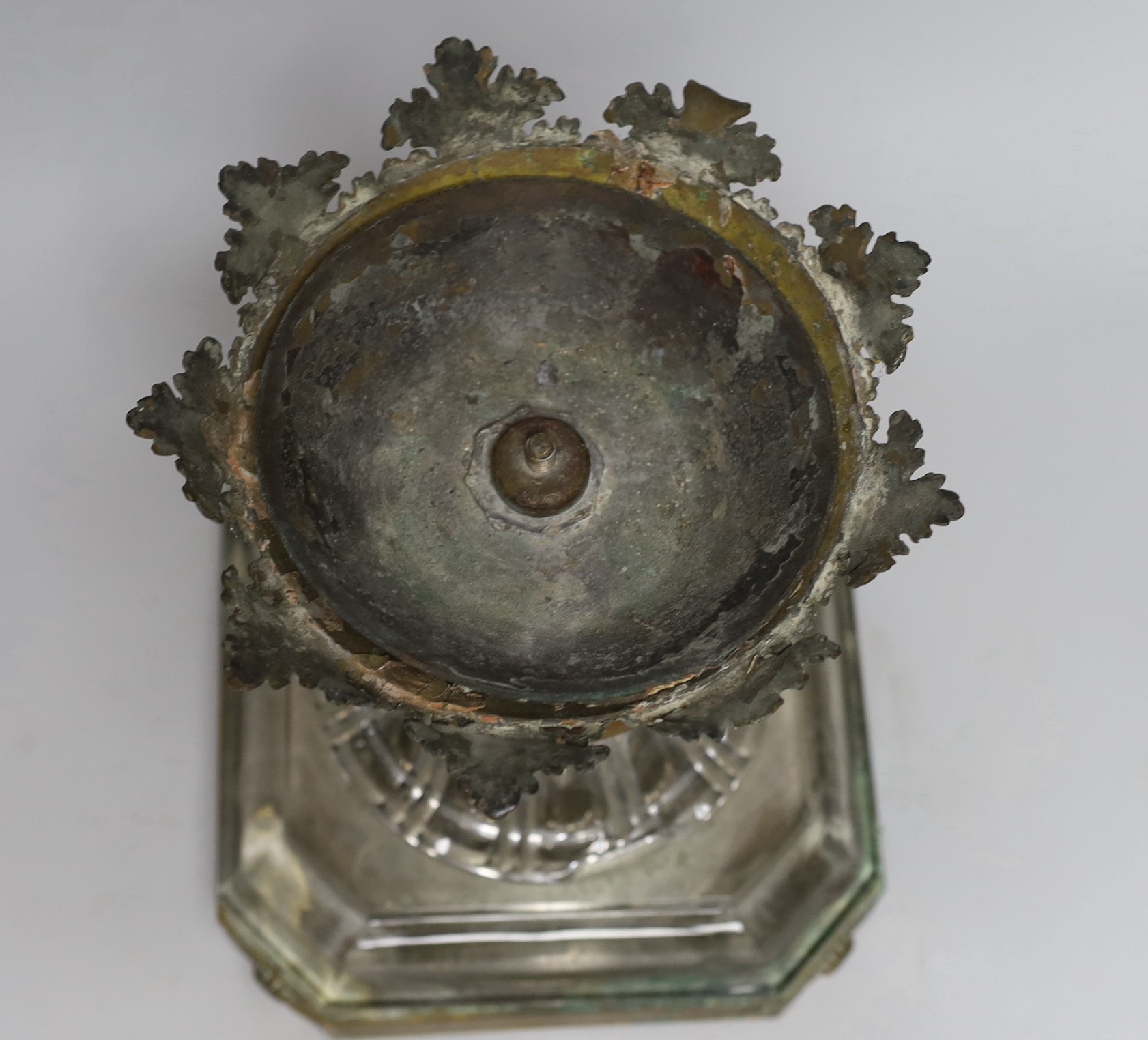 A 19th century Baccarat glass and brass pedestal base from a large table centre, small Baccarat stamp to centre of base underneath, 27cms high
